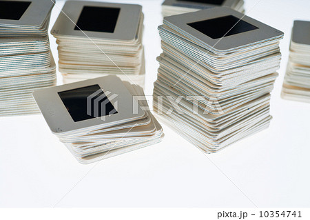 Close up of slides in piles on light box Close up of slides in piles on light box 10354741