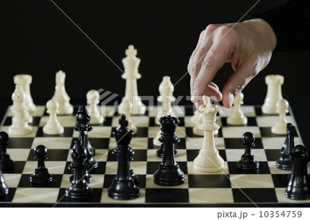 Close-up of man's hand playing chess Close-up of man's hand playing chess 10354759