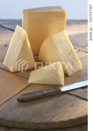 Cheese on chopping board Cheese on chopping board 10354782