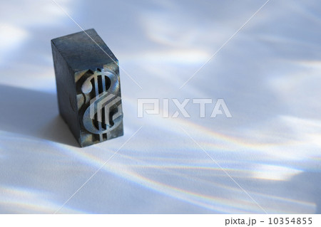 Close up of printing block with dollar sign Close up of printing block with dollar sign 10354855