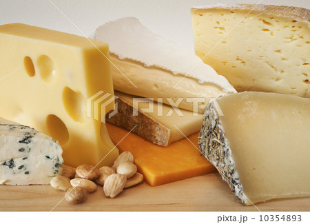 Various cheeses on chopping board 10354893
