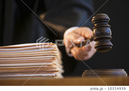 Judge holding gavel, close-up Judge holding gavel, close-up 10354939
