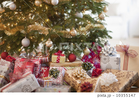 Colorful gifts under christmas tree Colorful gifts under christmas tree 10355147