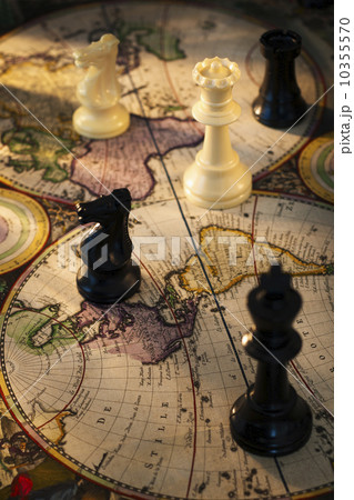 Chess pieces on old world map Chess pieces on old world map 10355570