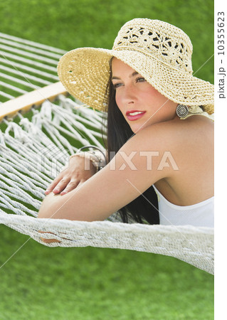 Woman relaxing in hammock 10355623