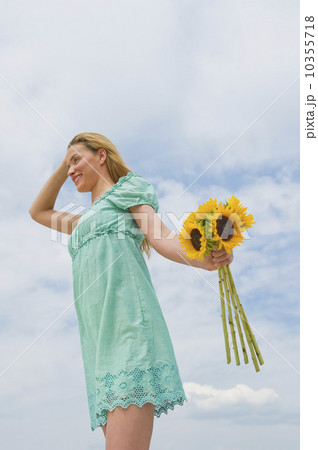 Woman holding sunflowers 10355718