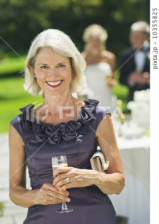 Portrait of mother of bride at wedding reception 10355825