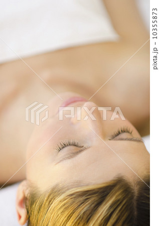 Woman relaxing at health spa 10355873