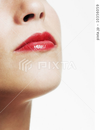 Studio shot of young woman wearing red lipstick 10356059