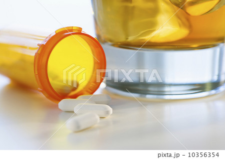 Pills and alcohol, studio shot 10356354