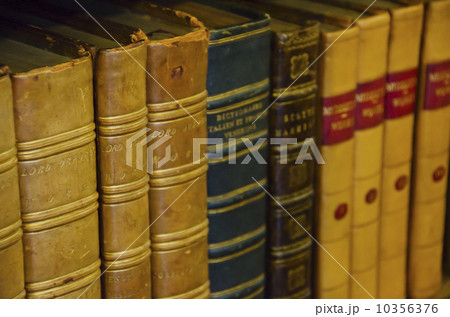 Close up of antique books on shelves 10356376