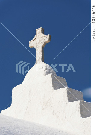 Greece, Cyclades Islands, Mykonos, Cross on church roof Greece, Cyclades Islands, Mykonos, Cross on church roof 10356416