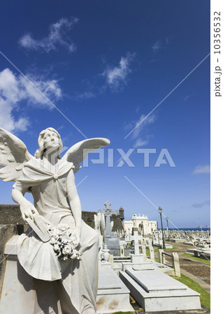 Puerto Rico, Old San Juan, Santa Maria Magdalena Cemetery with El Morro Fortress in background  10356532