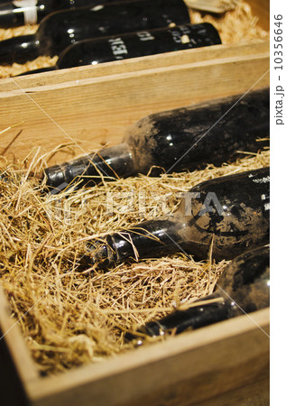Old wine bottles in wooden box Old wine bottles in wooden box 10356646