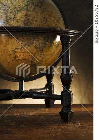 Close up of antique globe on table 10356722