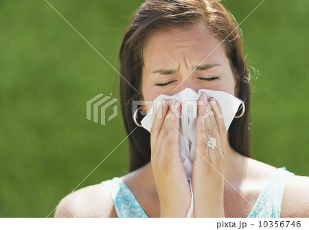 Woman blowing nose 10356746