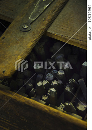 Close up of printing blocks from antique book binding 10356964