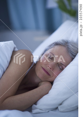 Senior woman sleeping in bed Senior woman sleeping in bed 10357490