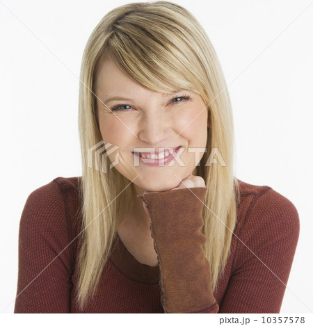 Studio portrait of smiling woman Studio portrait of smiling woman 10357578