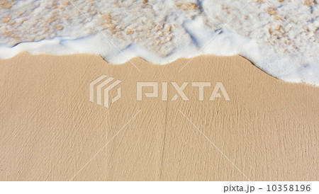 Sea waves on beach sand 10358196