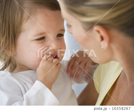 Mother holding daughter (2-3) 10358267