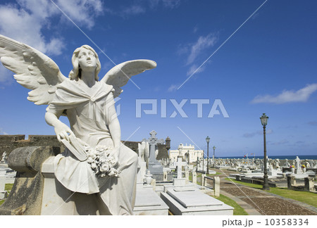 Puerto Rico, Old San Juan, Santa Maria Magdalena Cemetery with El Morro Fortress in background  10358334