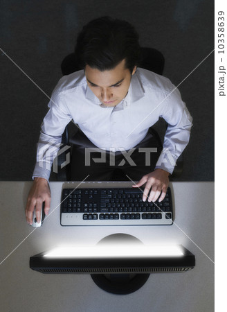 Man working with computer, studio shot 10358639