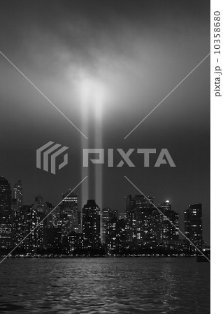 USA, New York City, Manhattan skyline with 9/11 memorial lights 10358680
