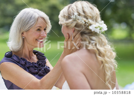 Bride with mother at wedding day 10358818