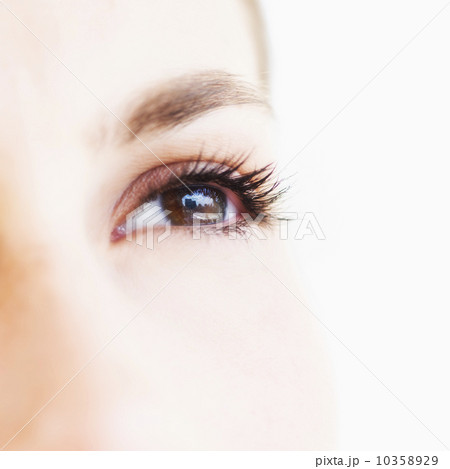 Studio shot of young woman, close-up of eye 10358929
