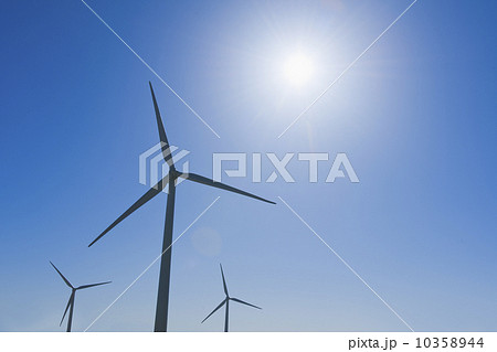 Wind turbine against blue sky 10358944