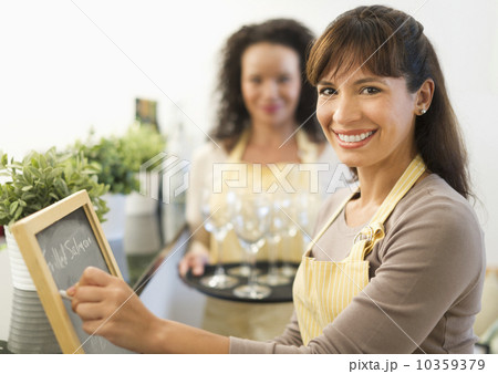 Two female business owners in restaurant 10359379