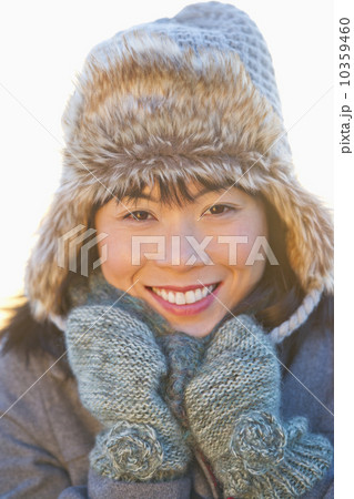 Portrait of smiling mid adult woman 10359460