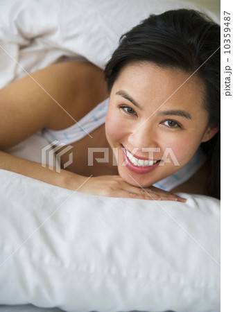 Woman lying in bed 10359487