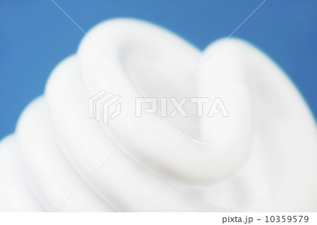 Studio shot of energy efficient lightbulb on blue background 10359579