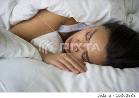 Woman sleeping in bed Woman sleeping in bed 10360838