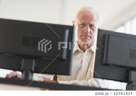 Senior professional working on computer 10361824