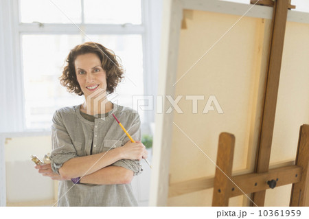 Portrait of female painter in studio 10361959