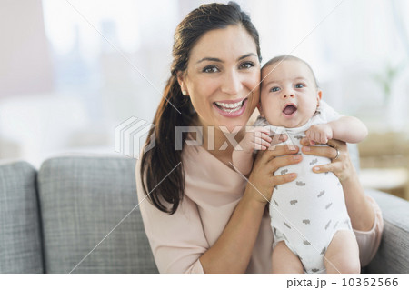 Mother holding baby boy (2-5 months) Mother holding baby boy (2-5 months) 10362566
