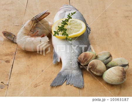 Fresh raw seafood on table, studio shot Fresh raw seafood on table, studio shot 10363187