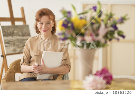 Portrait of female artist in studio 10363520