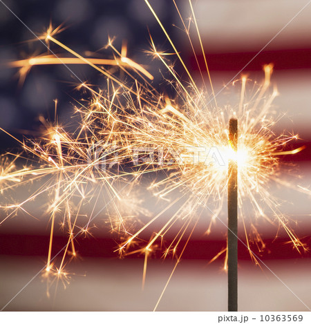 Sparkler and American flag Sparkler and American flag 10363569
