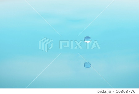 Drop falling into water Drop falling into water 10363776