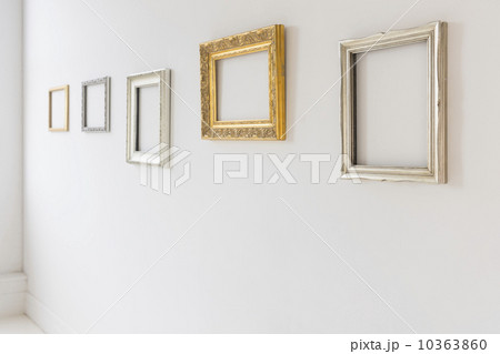 Empty picture frames in art gallery 10363860