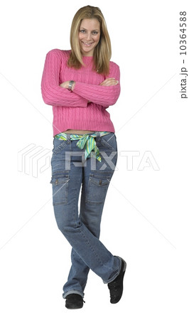 A young woman standing with her arms folded 10364588