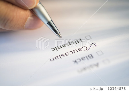 Close-up of hand filling out form Close-up of hand filling out form 10364878