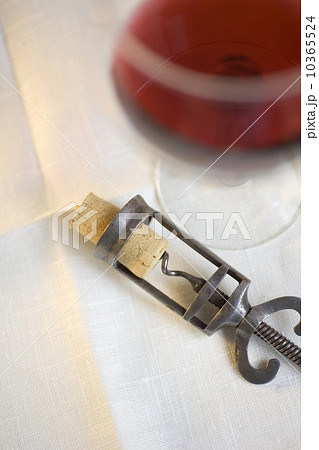Still life of corkscrew and wine Still life of corkscrew and wine 10365524