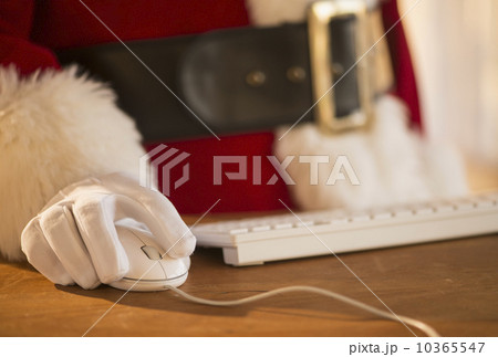 Close-up of santa claus using computer 10365547
