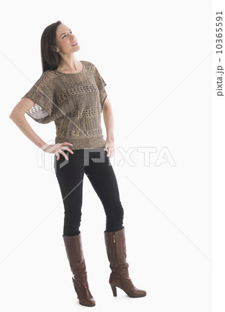 Portrait of mid adult woman looking up Portrait of mid adult woman looking up 10365591