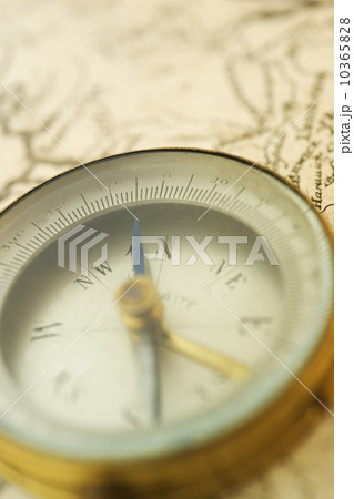Closeup of a map and compass Closeup of a map and compass 10365828